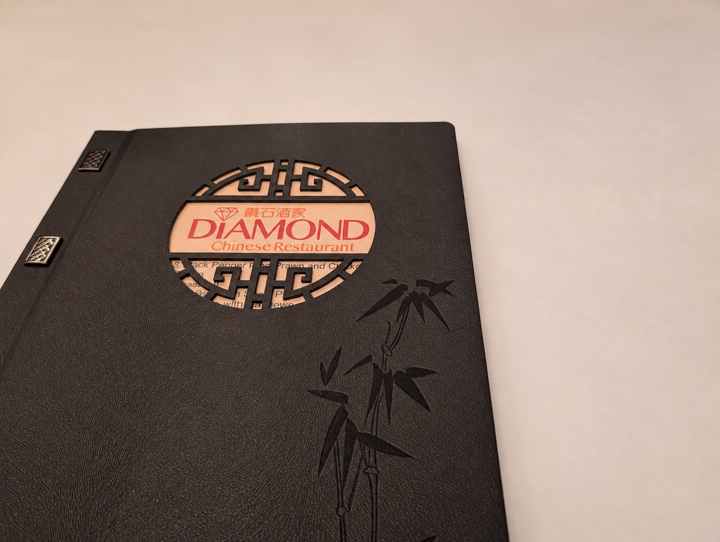 The Diamond restaurant menu on a clean table